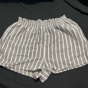 Gray shorts with white stripes